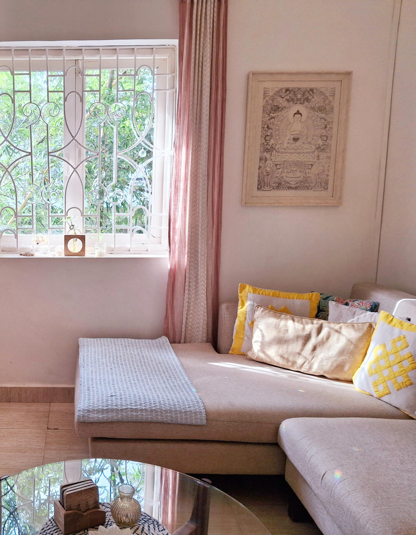 Click here for Strawberry apartment Cozy seating area with sofa, large window, and garden views.